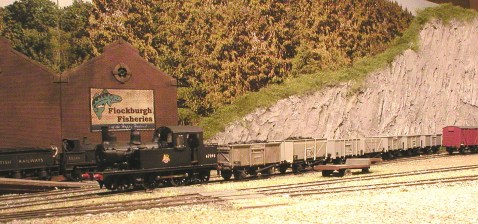 Crytal Palace Tank pulls a coal train in.